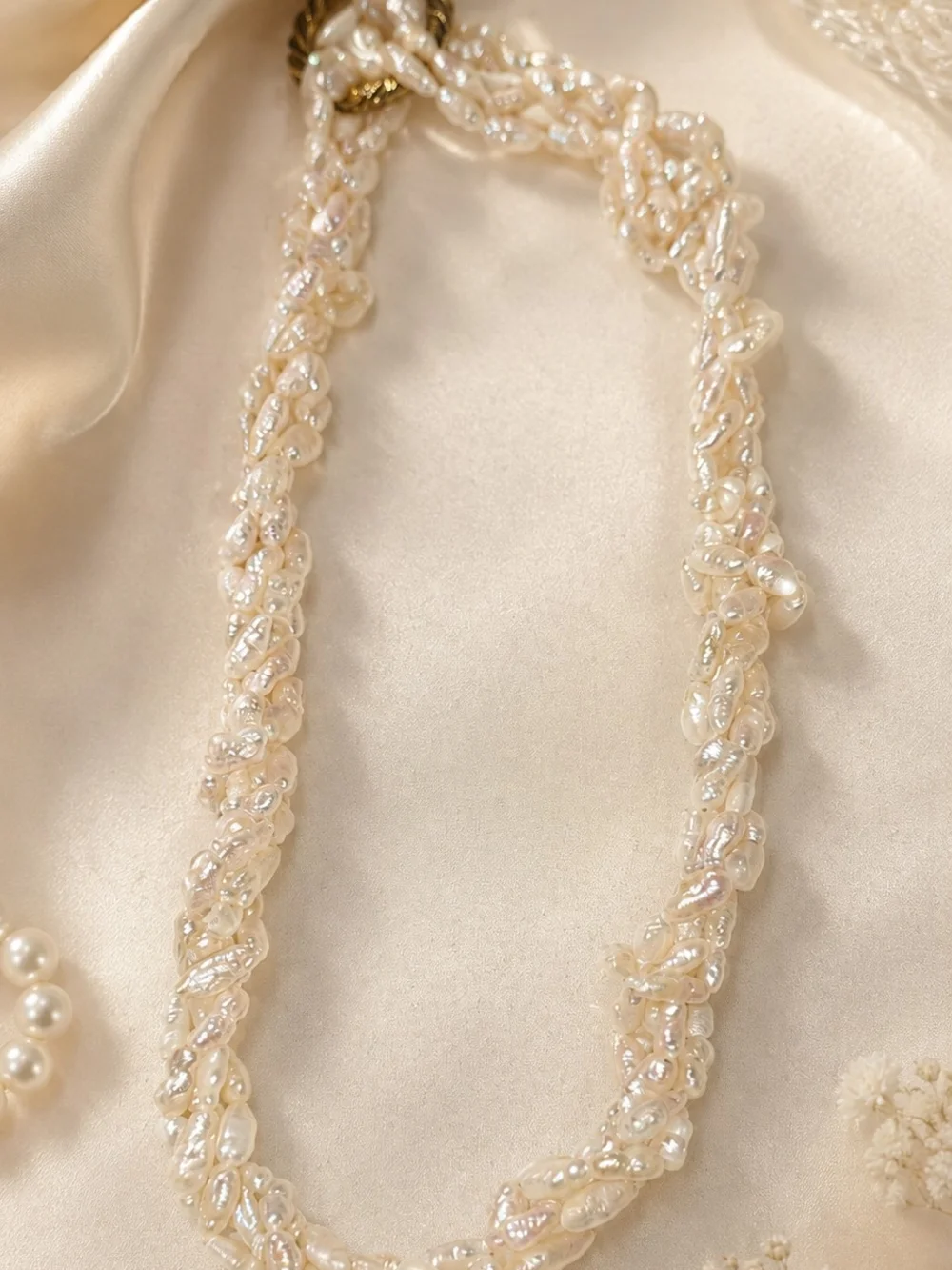 Multi-strand freshwater baroque and rice pearl twist necklace